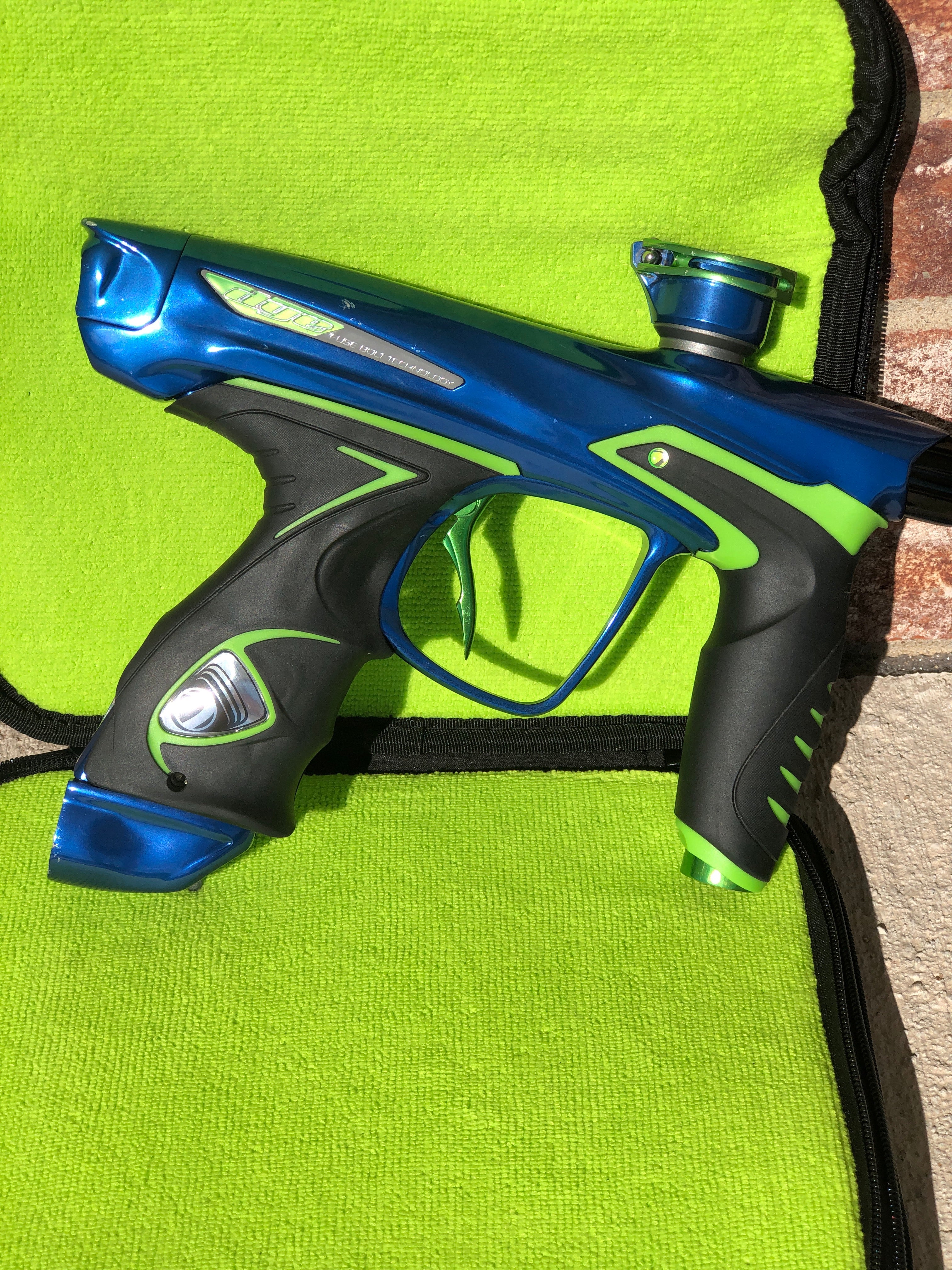 Used Dye DM14 Paintball Marker - Blue/Lime