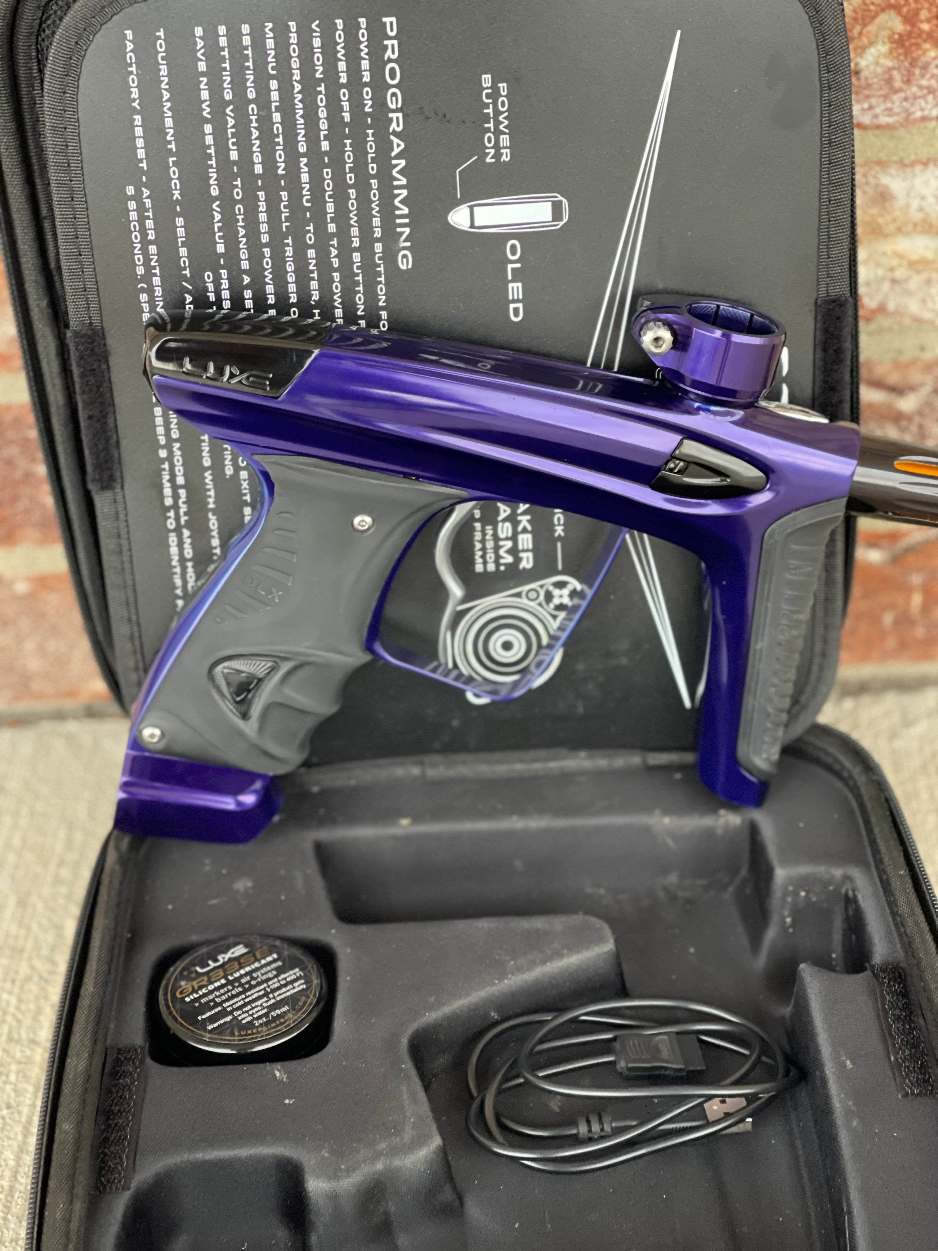 Used DLX Luxe Ice Paintball Gun - Purple / Black