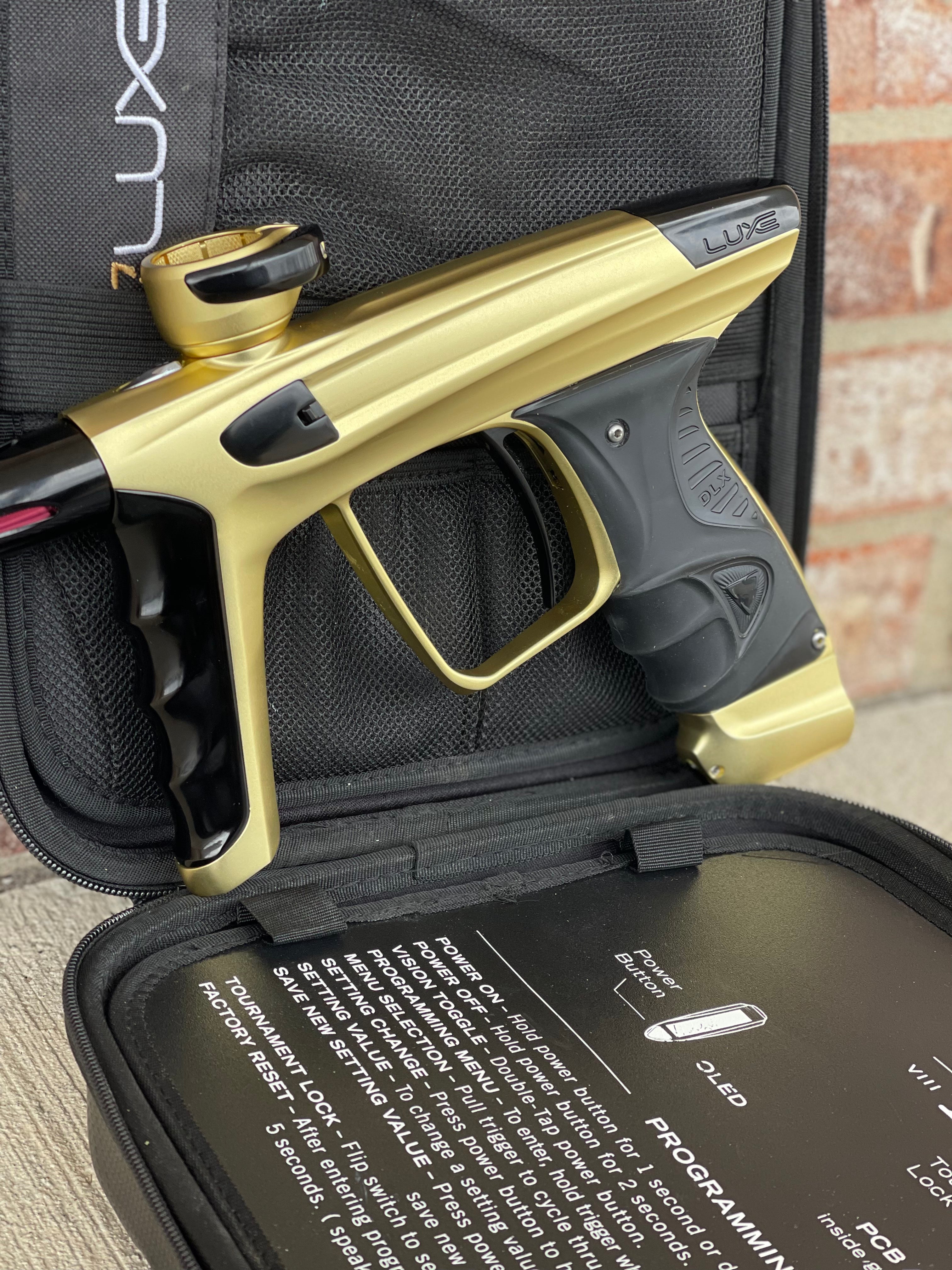 Used DLX Luxe X Paintball Gun - Dust Gold / Polished Black