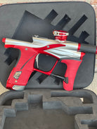 Used Planet Eclipse LV1.6 Paintball Gun - Silver / Red w/ Red and Black Grip Kits and Aluminum FL Tip