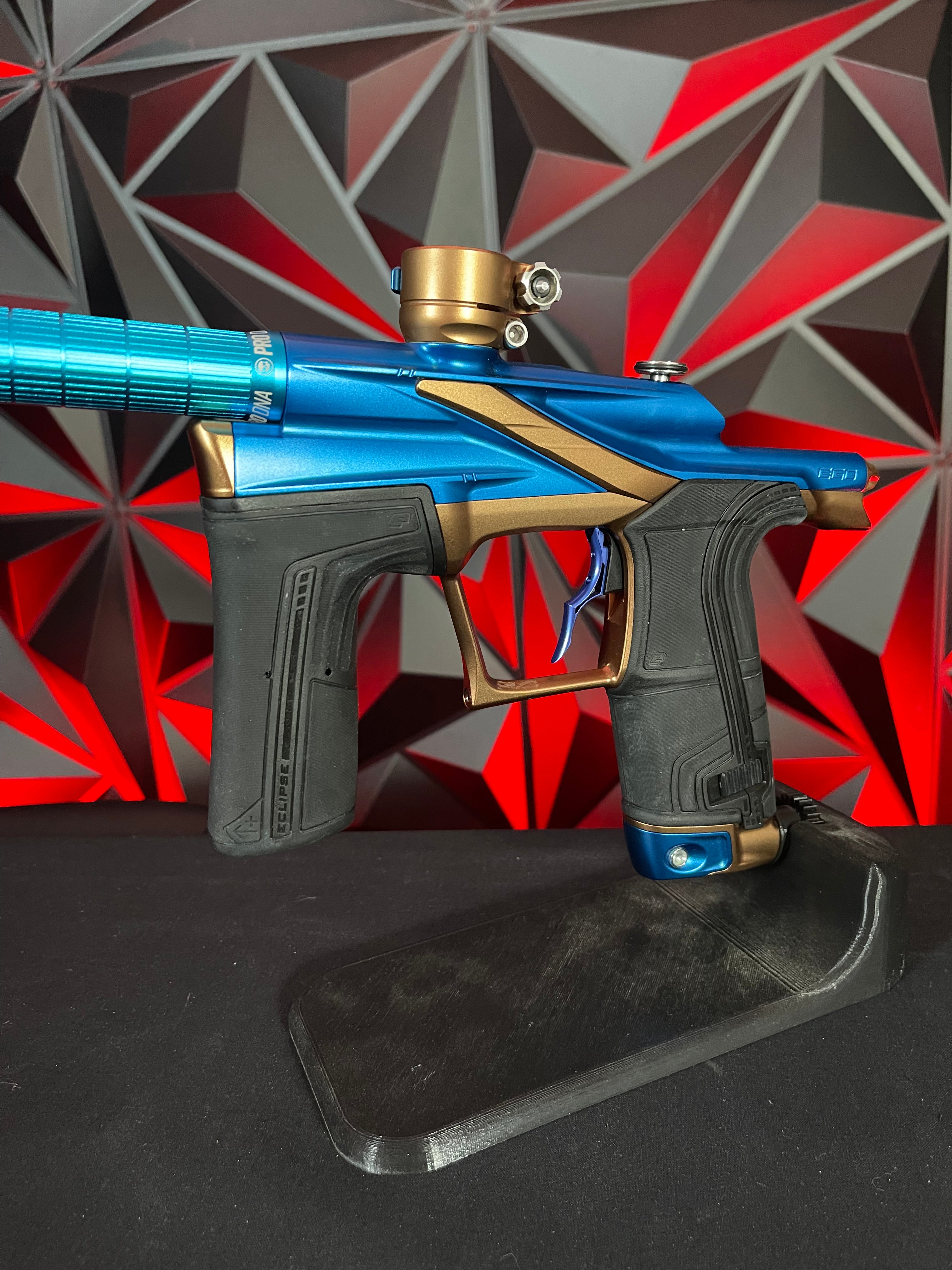 Used Planet Eclipse LV2 Paintball Gun - Blue/Bronze w/ Silencio Power Grip Back *Houston Heat Signed Case*