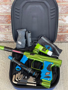 Used Shocker Amp Paintball Gun - Green/Black with Infamous Deuce Trigger and Blue Grips