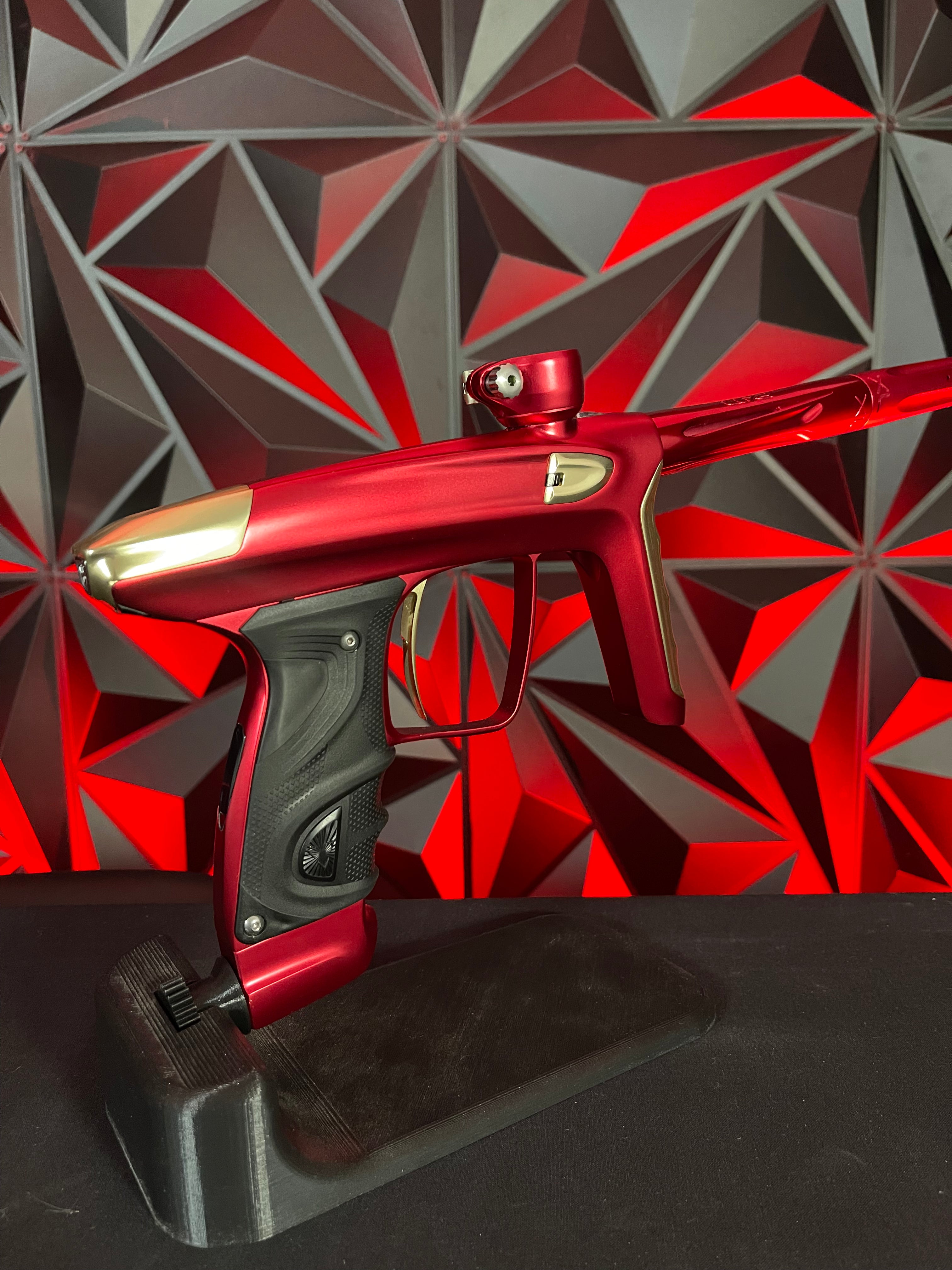 Used DLX Luxe TM40 Paintball Gun - Dust Red / Gloss Gold