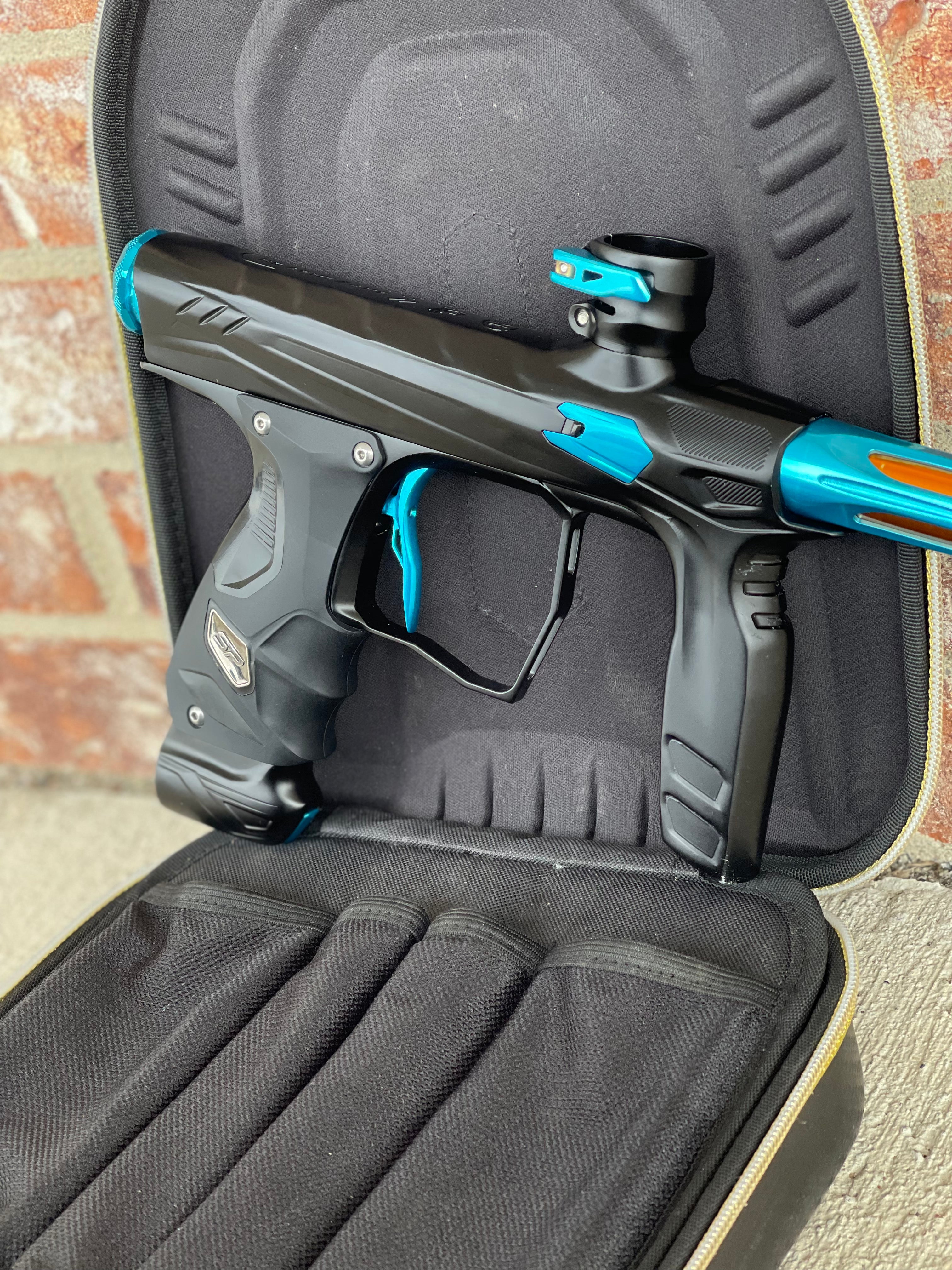 Used HK Army Shocker Amp Paintball Gun - Black/Teal