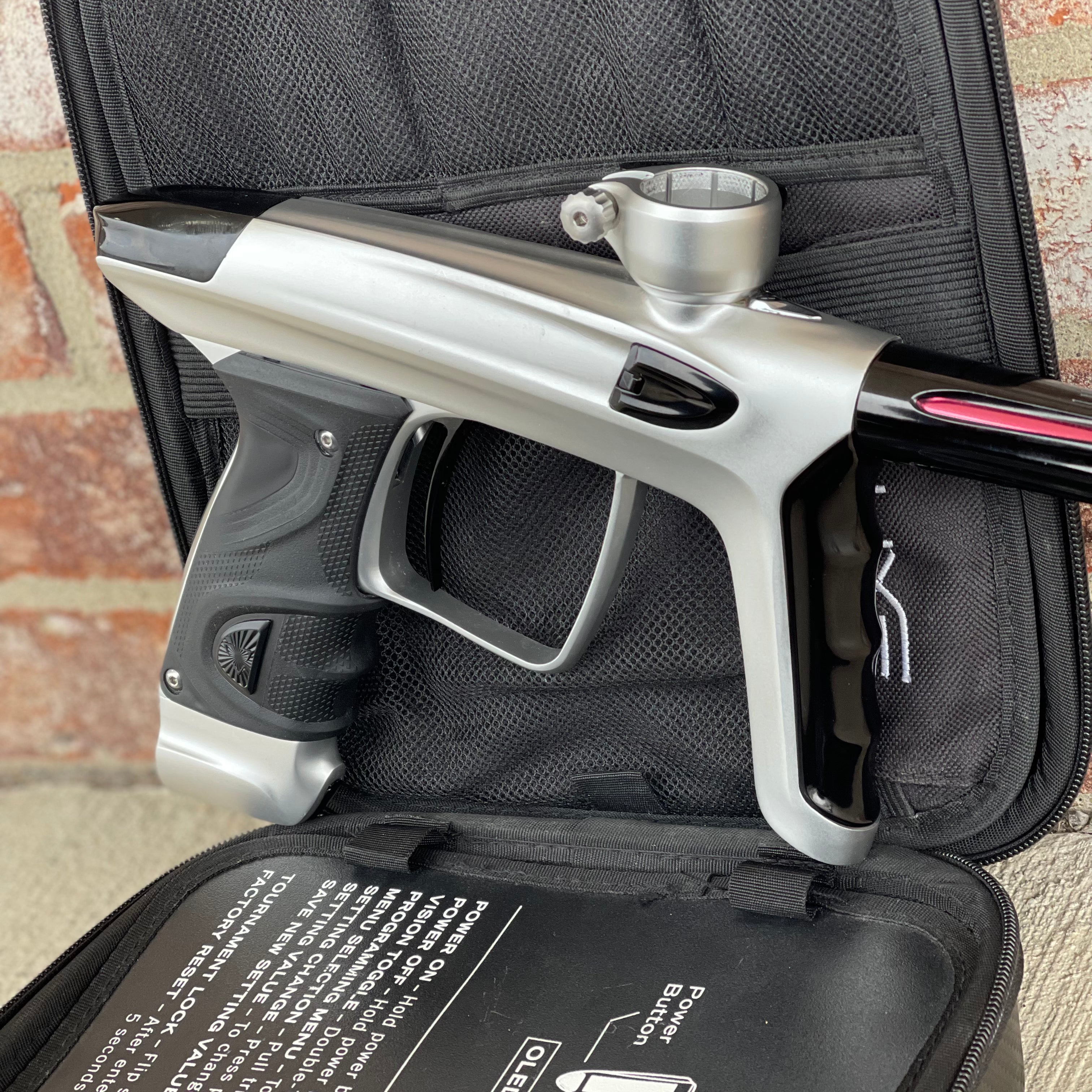 Used DLX Luxe TM40 Paintball Gun - Dust Silver/Gloss Black w/ Stock Bolt and SSC Bolt