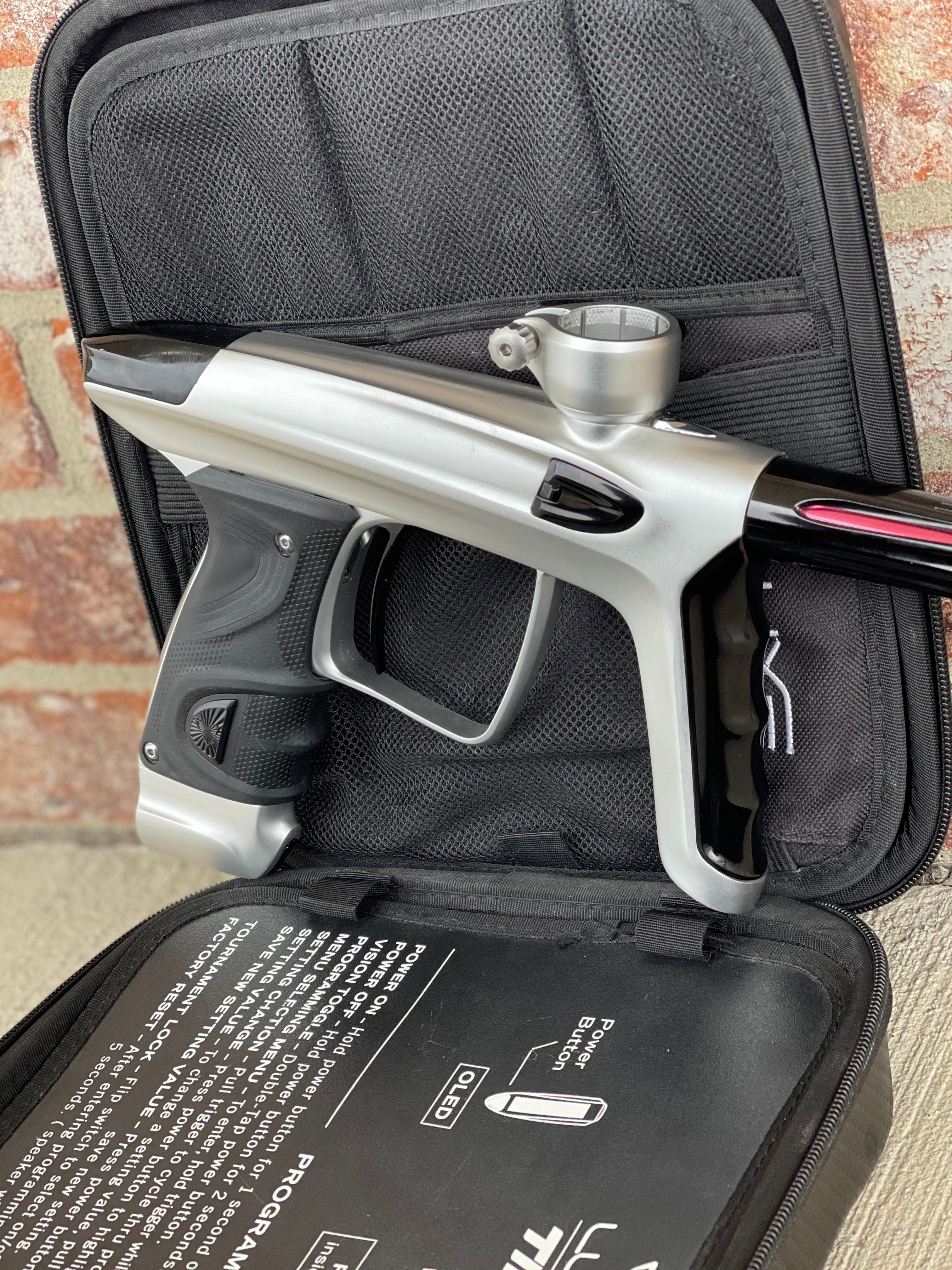 Used DLX Luxe TM40 Paintball Gun - Dust Silver/Gloss Black w/ Stock Bolt and SSC Bolt