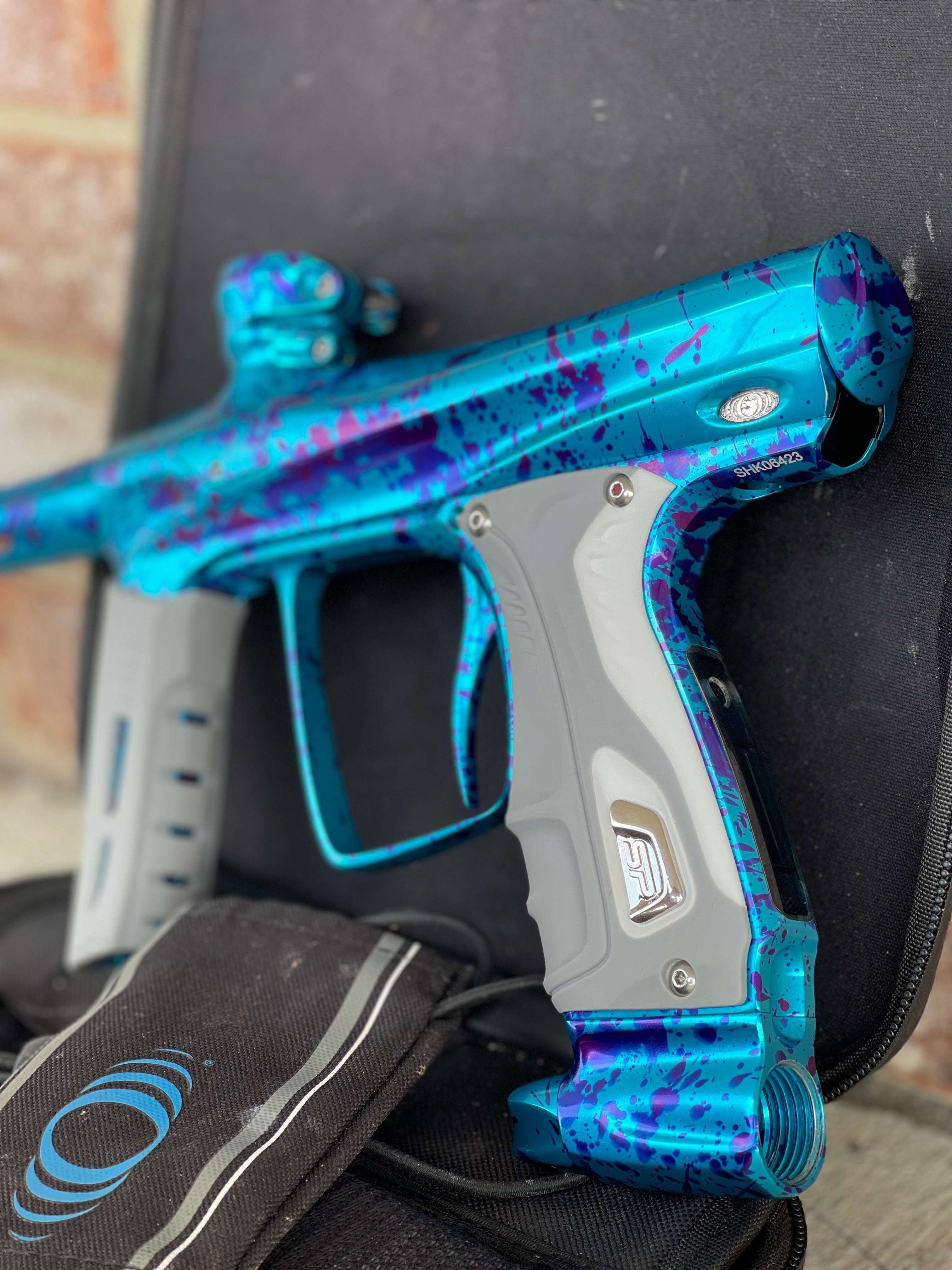 Used Shocker RSX Paintball Marker- Blue Splash