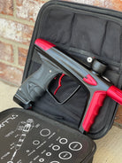 Used DLX Luxe Ice Paintball Gun - Dust Black / Dust Red w/ Infamous Deuce Trigger and 3 Freak Inserts