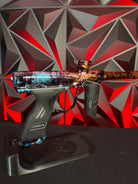 Used Dye DSR Paintball Gun - Blue/Orange Polished Cosmic Fade w/Flex Face Bolt + Can