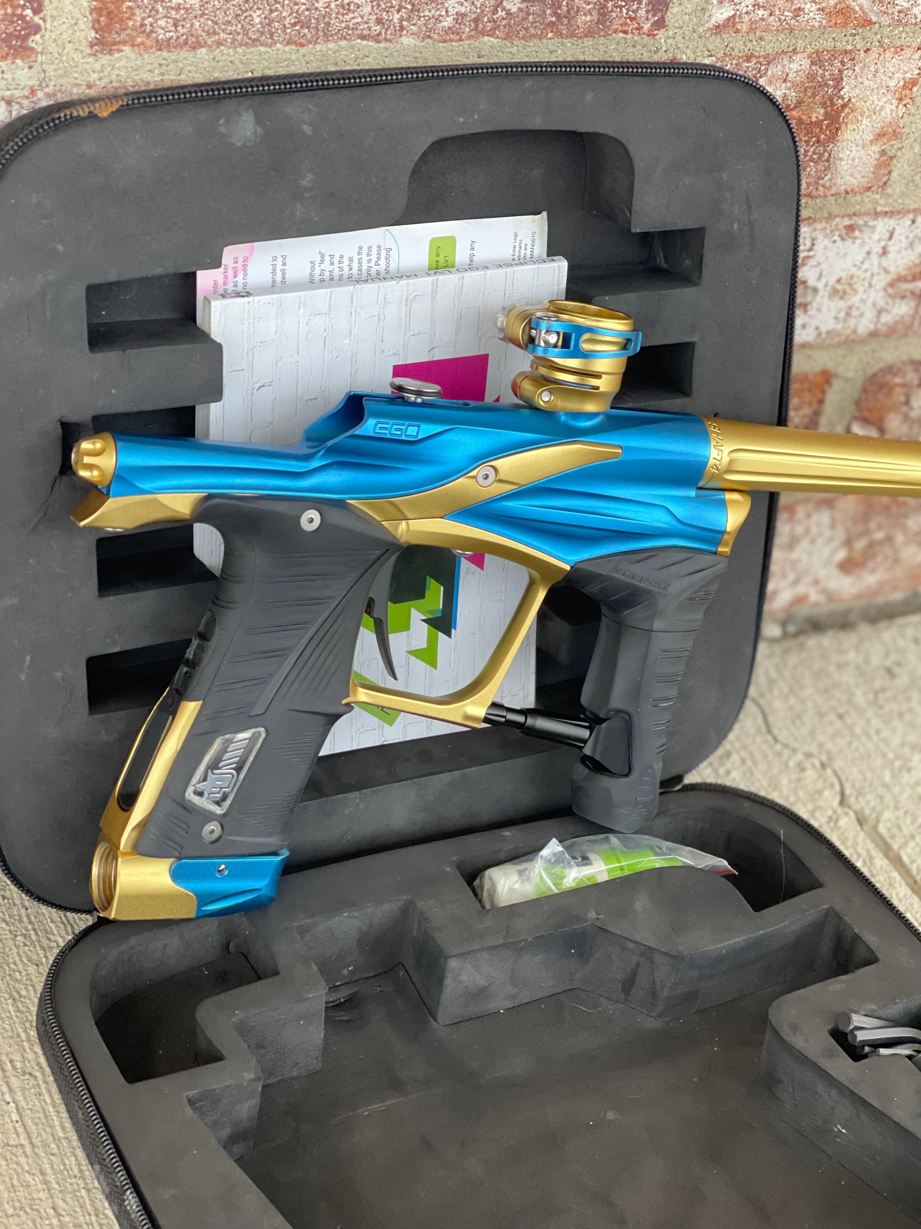 Used Eclipse Ego LV1 Paintball Marker Blue / Gold w/ Blade Tri