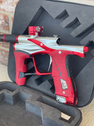 Used Planet Eclipse LV1.6 Paintball Gun - Silver / Red w/ Red and Black Grip Kits and Aluminum FL Tip