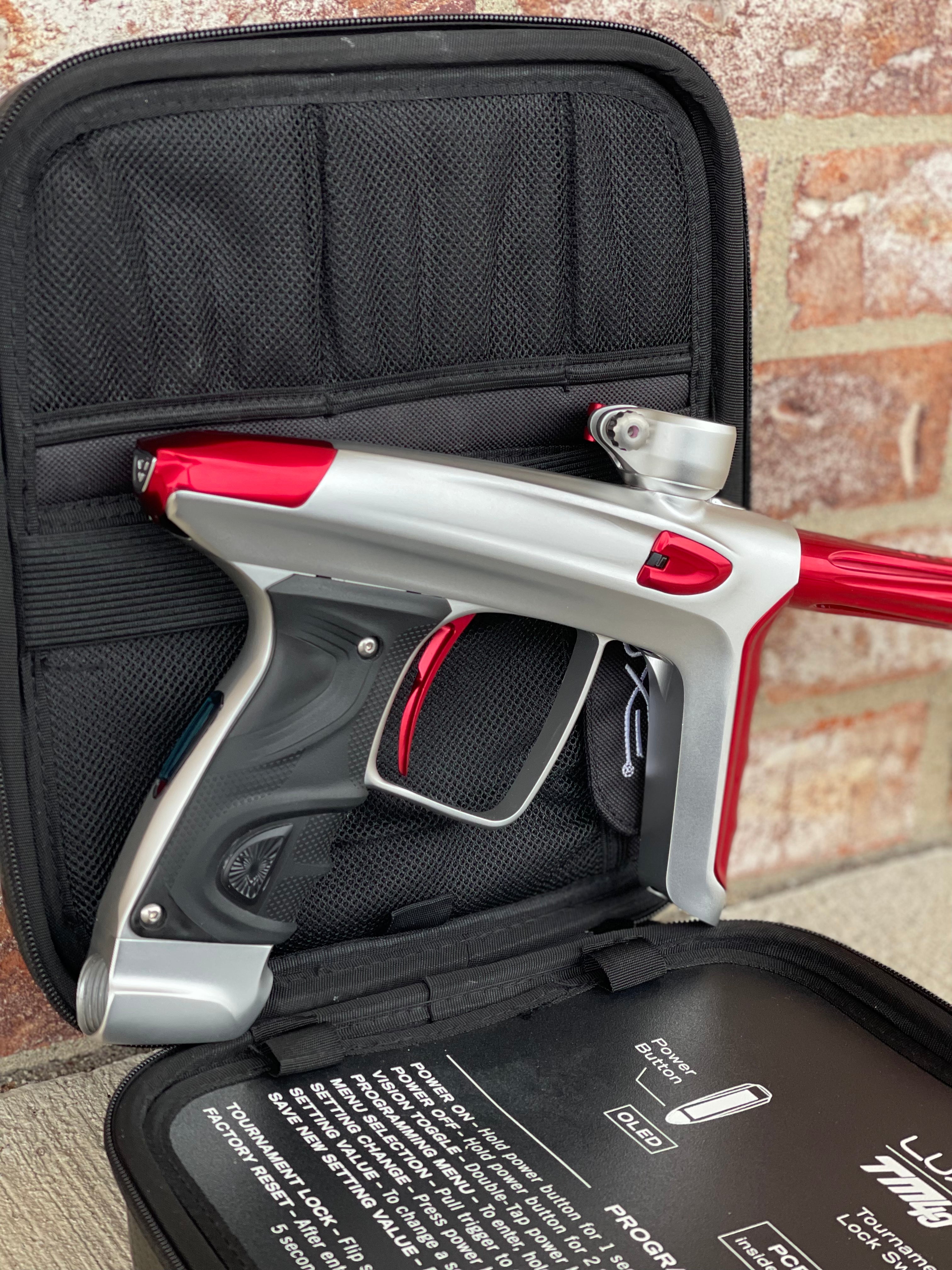 Used DLX Luxe TM40 Paintball Gun - Dust White / Polished Red