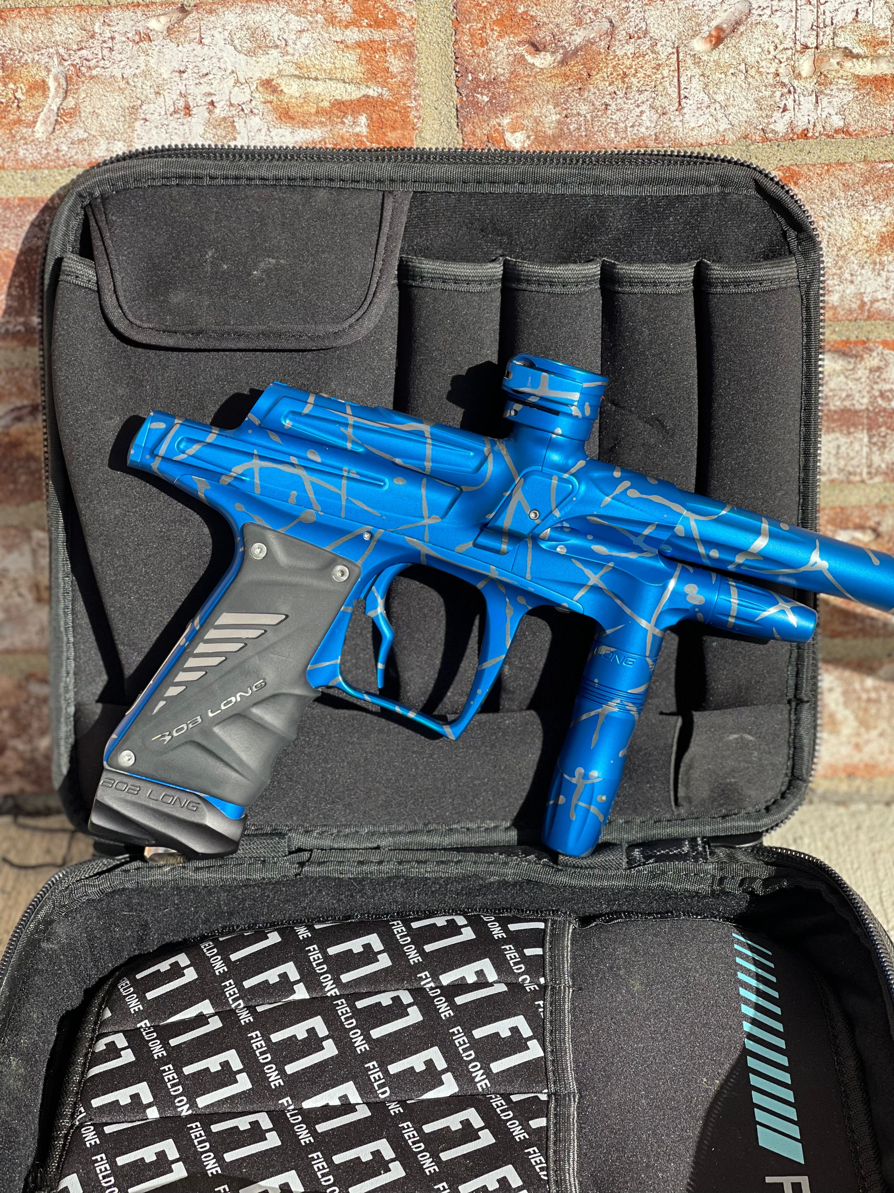 Used Bob Long G6R OLED Paintball Gun - Z Cut - Blue/Silver Splash