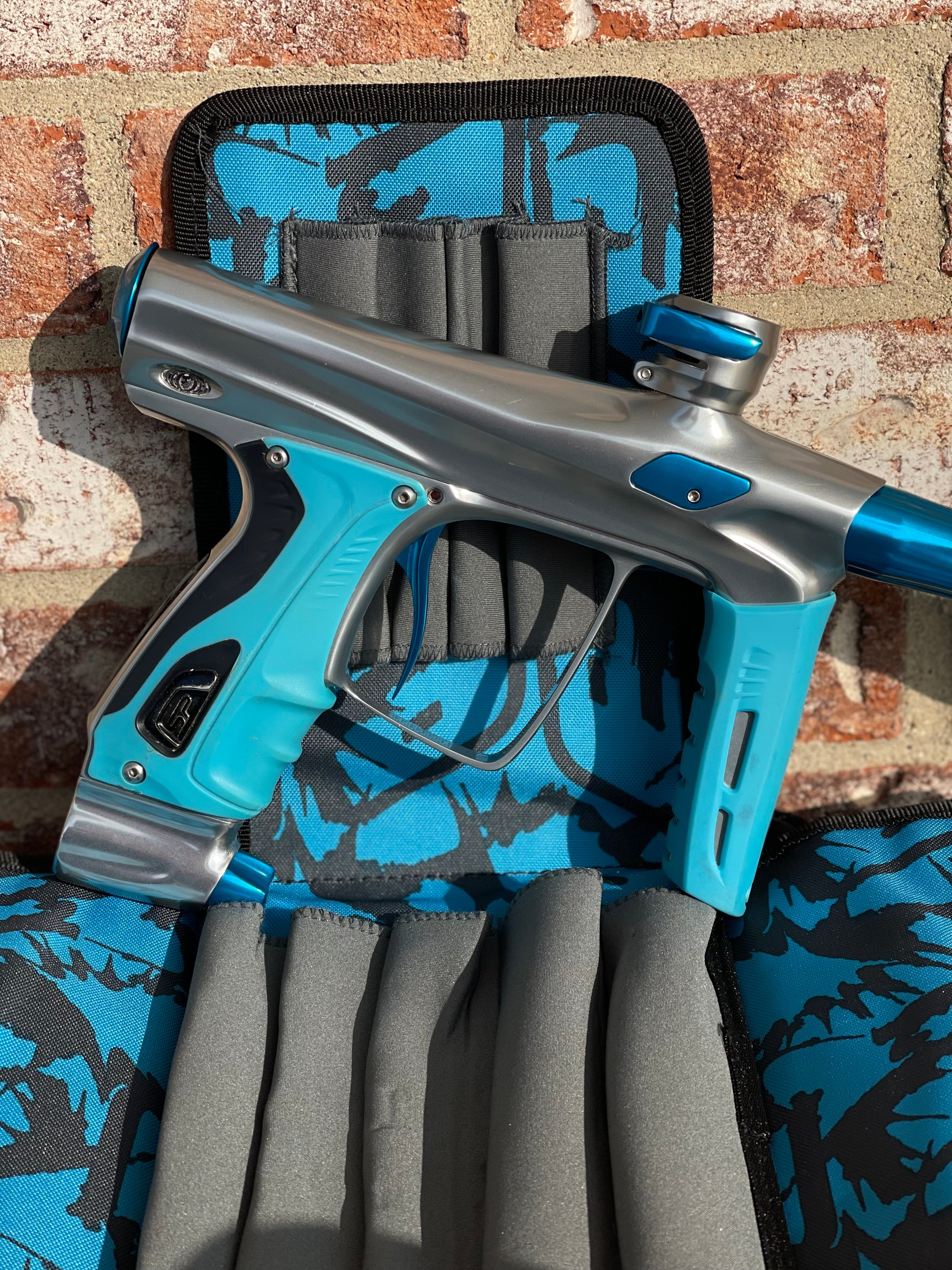 Smart Parts Shocker RSX Paintball Marker- Gloss Silver/Teal