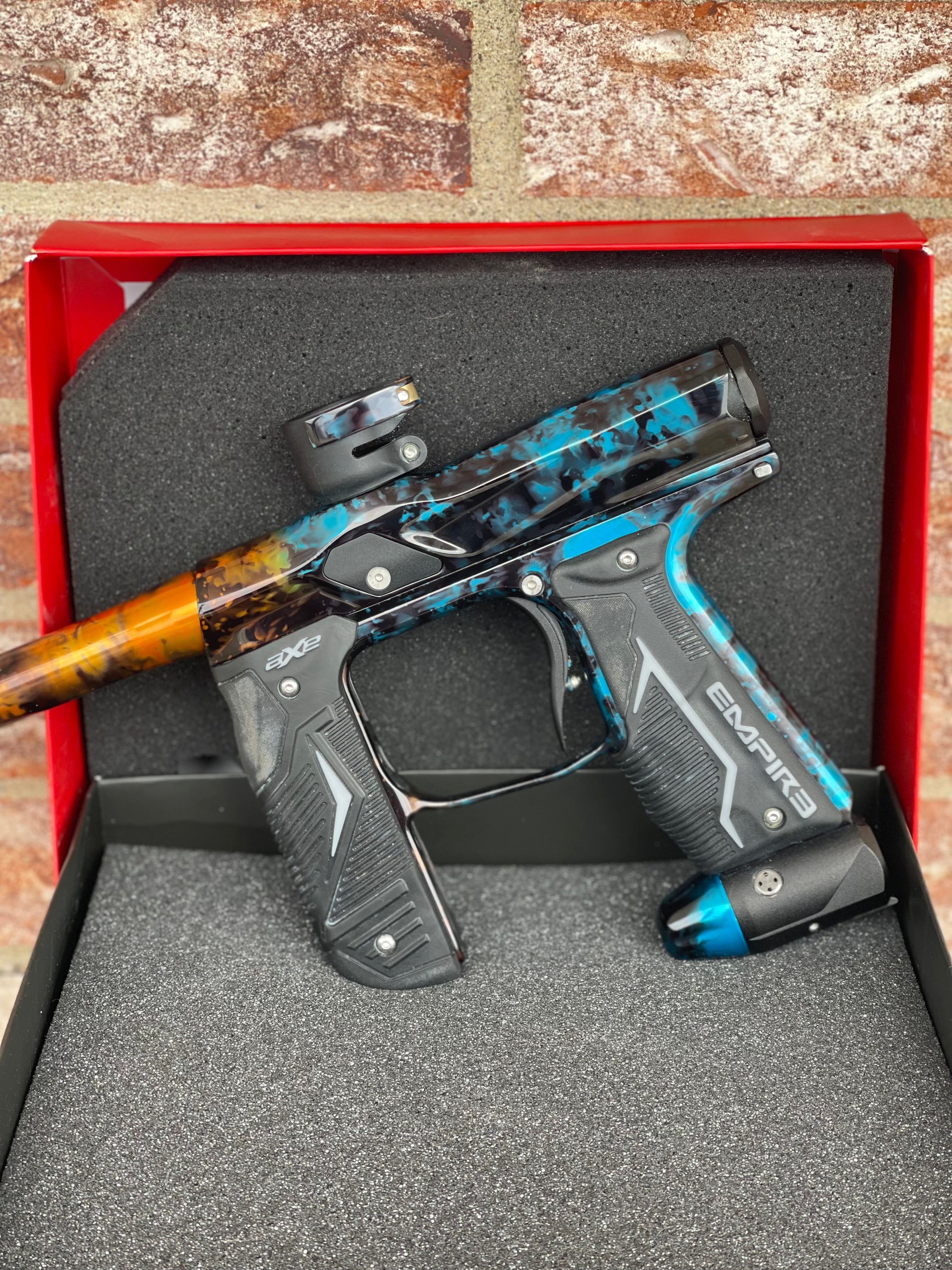 Used Empire Axe 2.0 Paintball Gun - Acid Wash Custom Anno (Orange Teal)