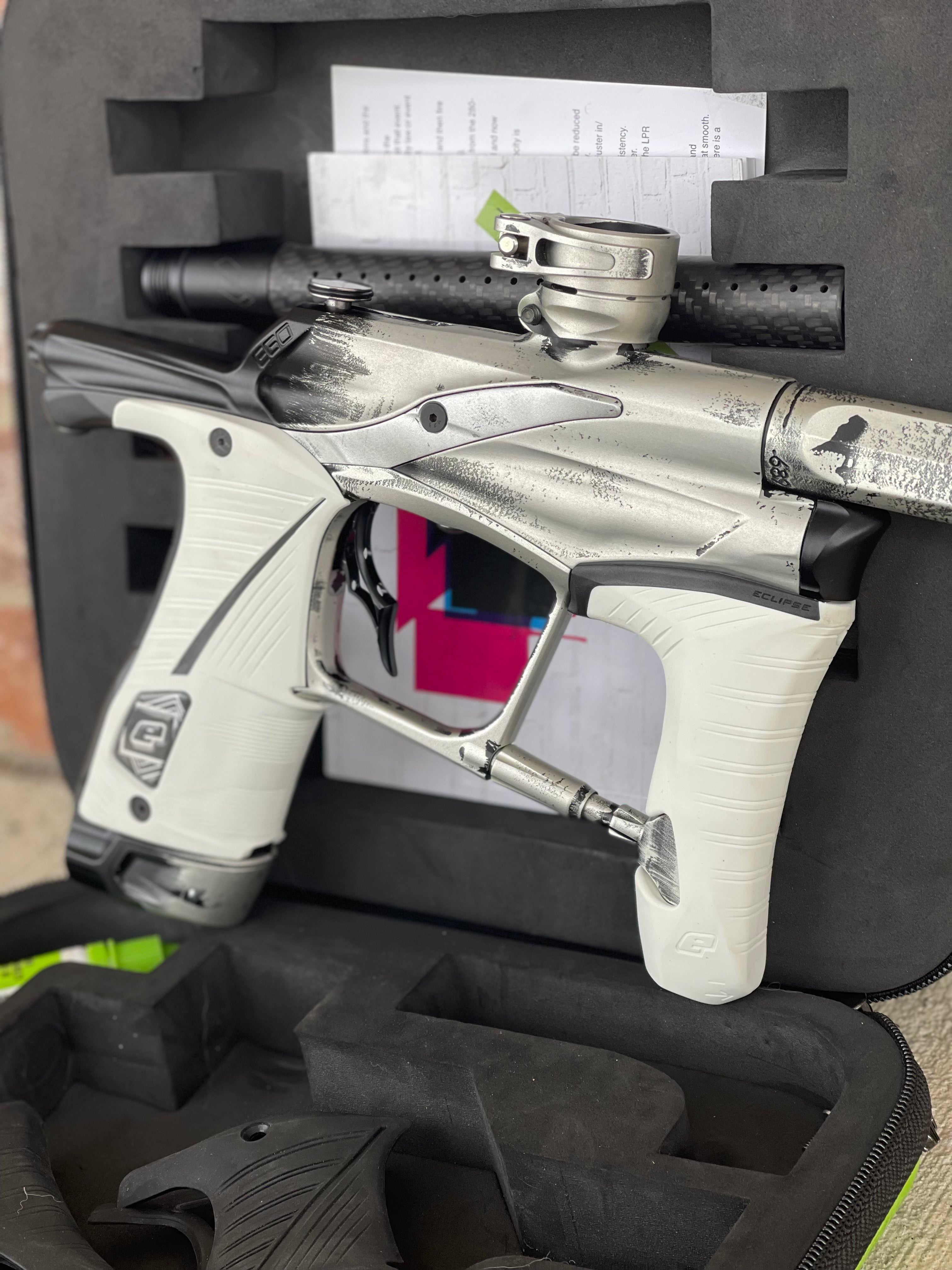 Used Planet Eclipse Ego Lv1.5 Paintball Marker- Silver/Black Fade Custom Anno w/ Infamous Deuce Trigger, White & Black Grips, Freak Barrel & Stock Barrel