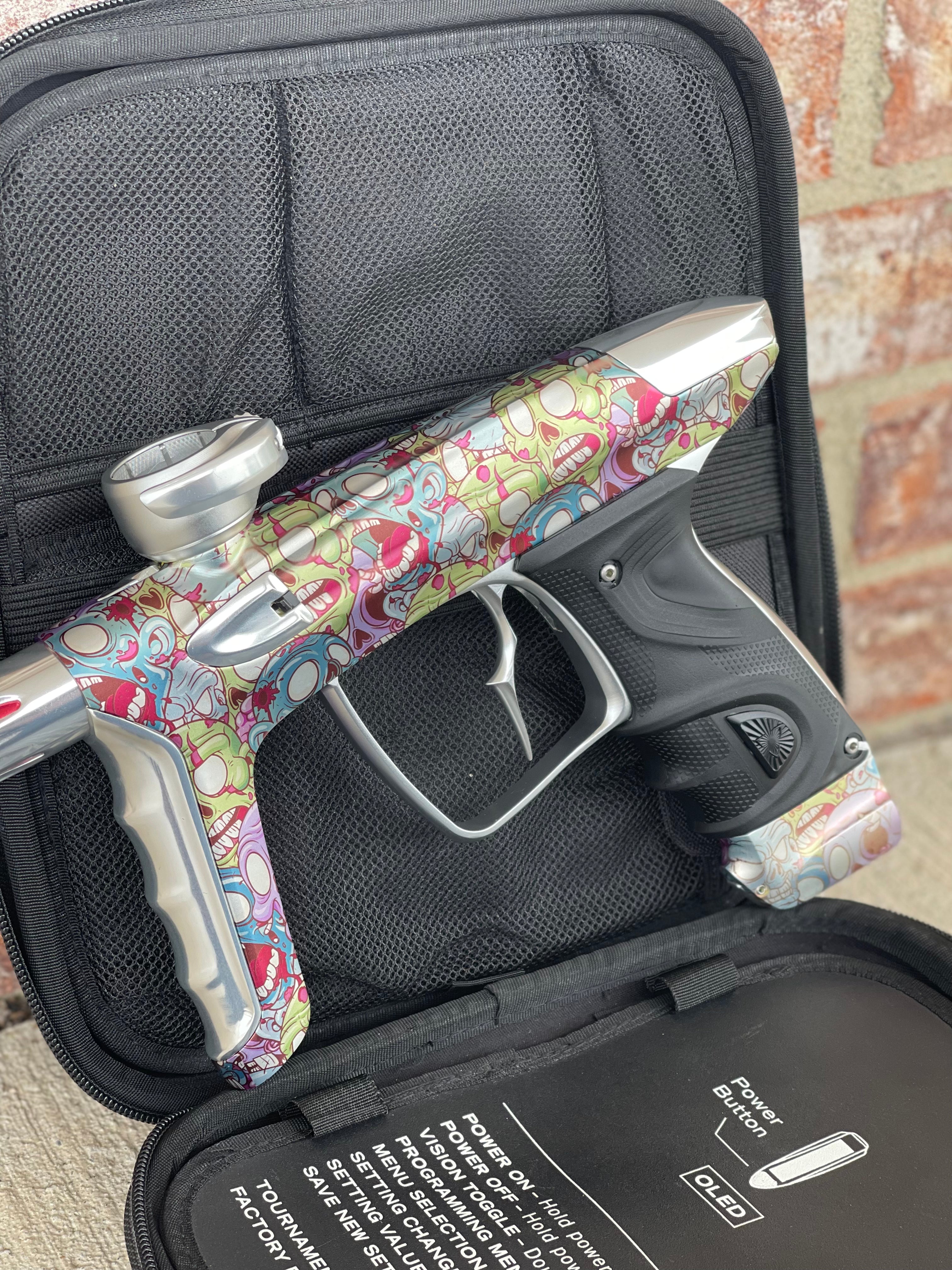 Used DLX Luxe TM40 Paintball Gun - LE Zombie Edition w/Silver Deuce Trigger & Wireless Charger