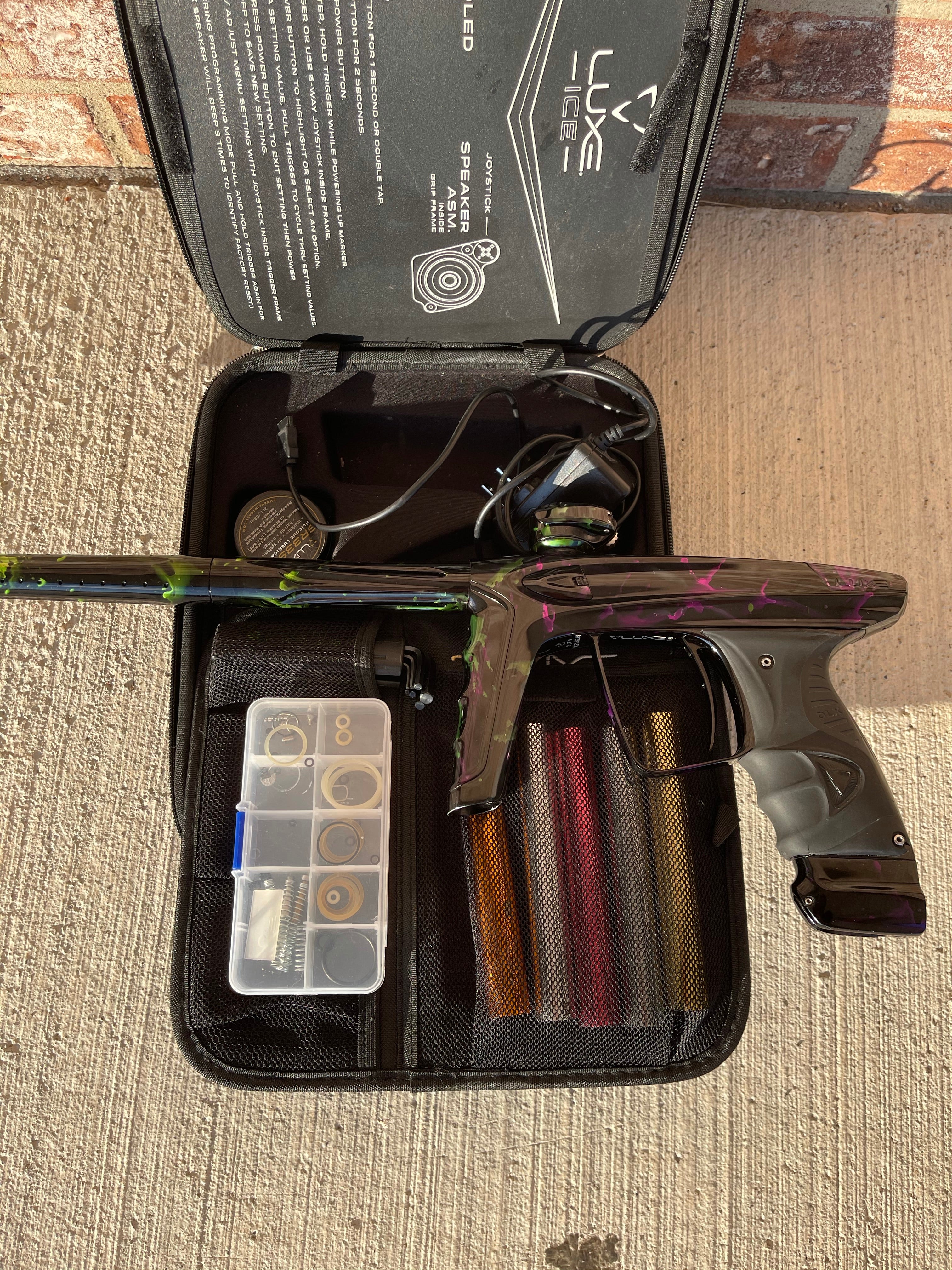 Used DLX Luxe Ice Paintball Gun - Acid Wash Green / Purple