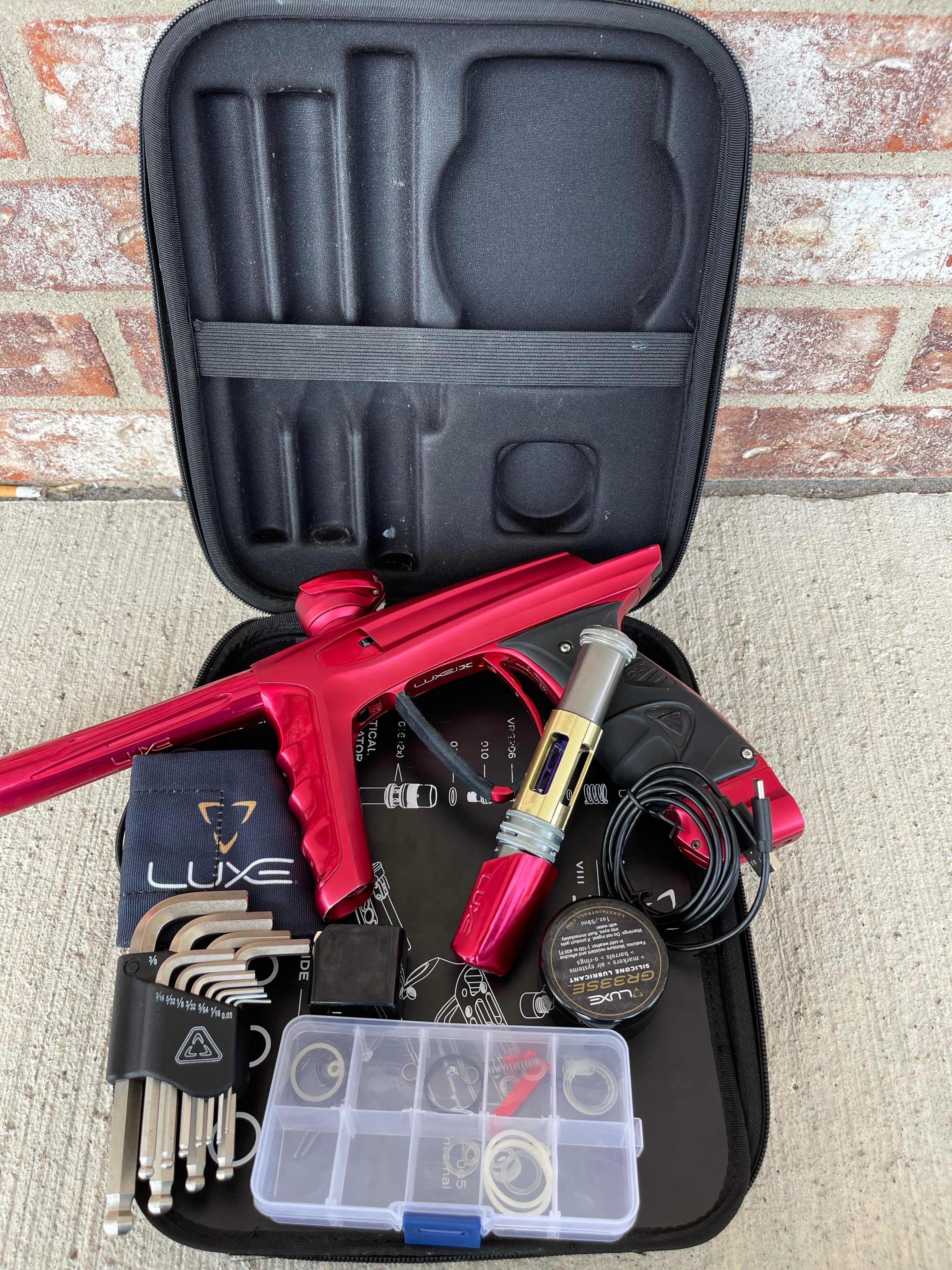 Used DLX Luxe X Paintball Gun - Dust Red / Gloss Red